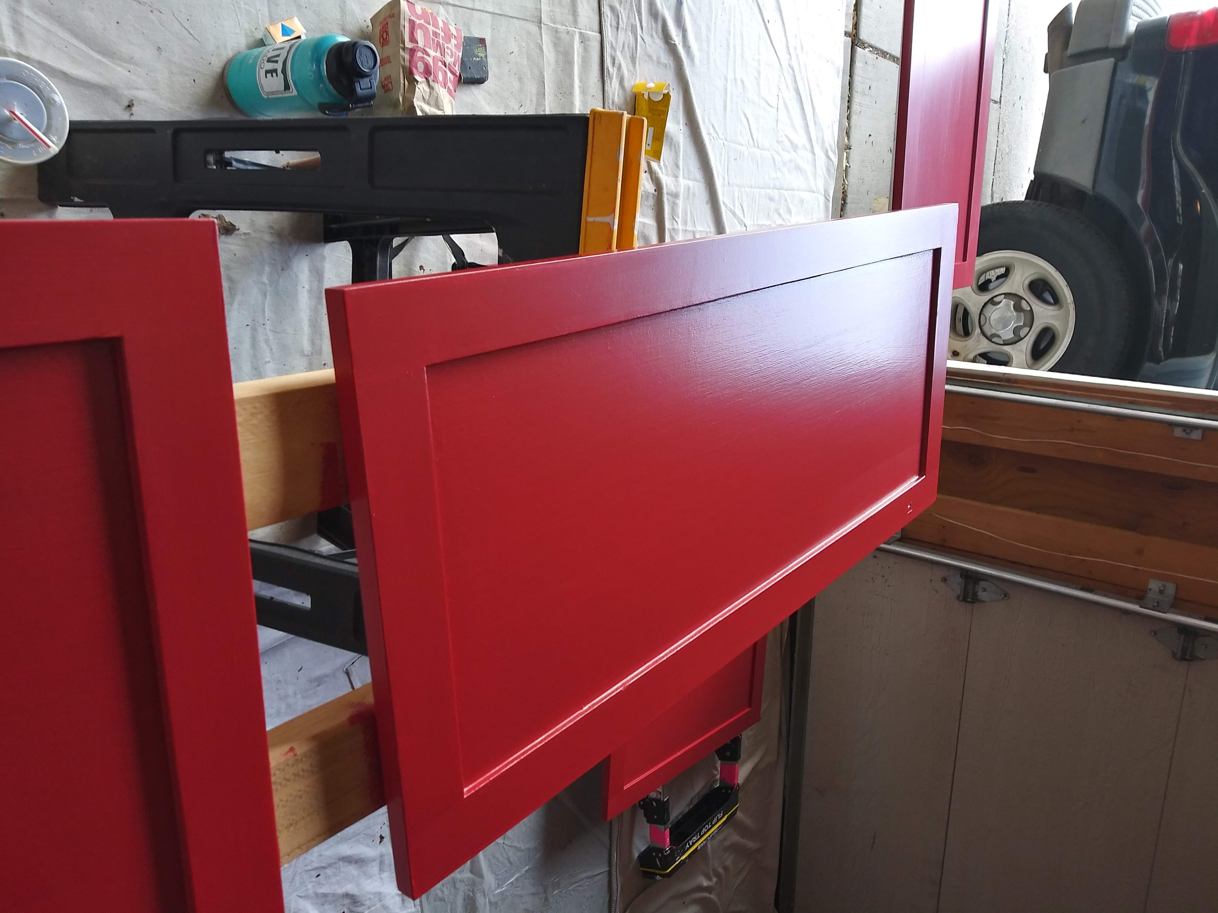 Cabinet doors refinished in a bold red enamel color