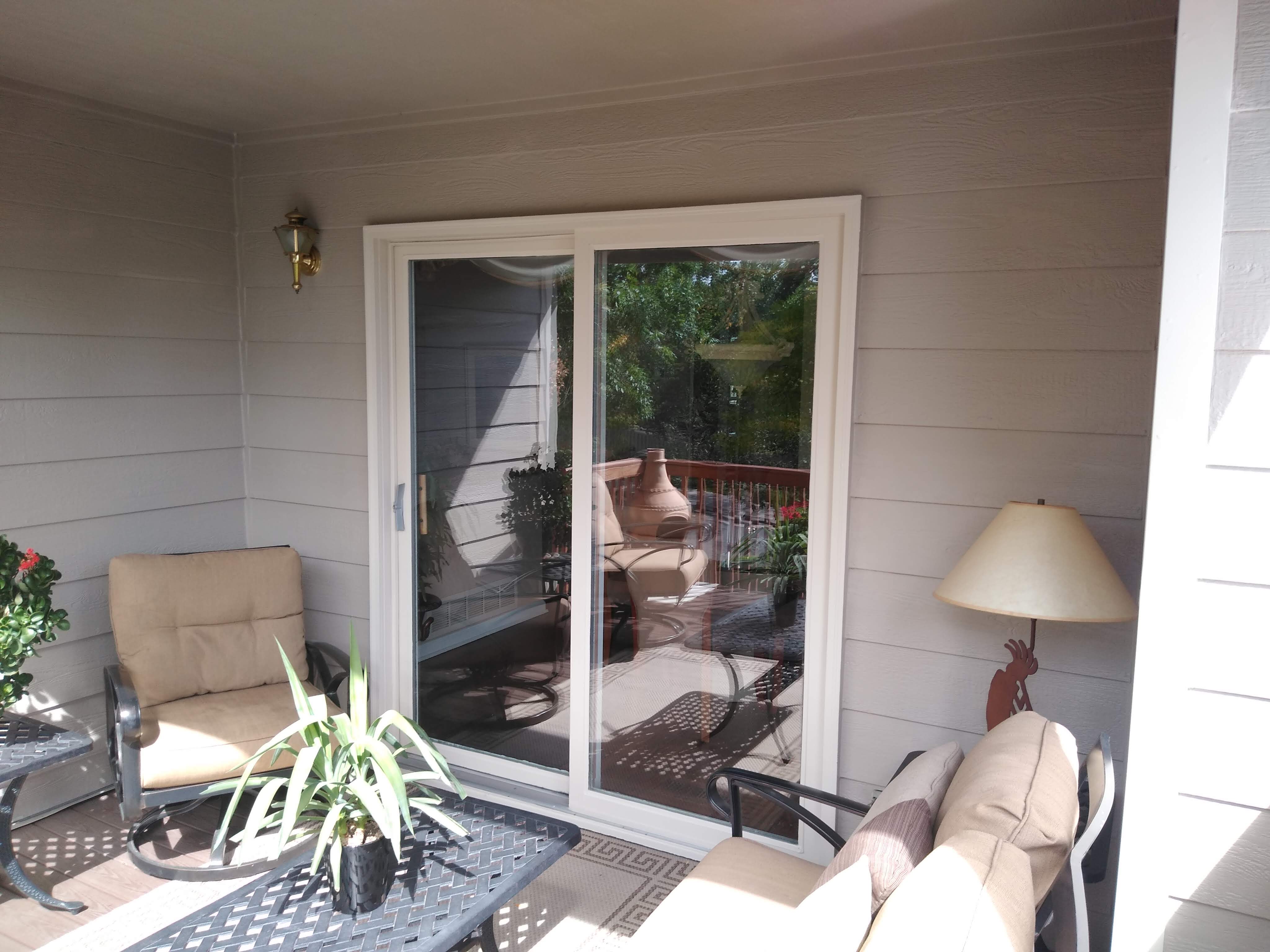 Completed exterior remodel with updated siding and trim